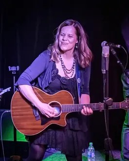 Joy Zimmerman performing for Acoustic in the Caves at Fence Stile