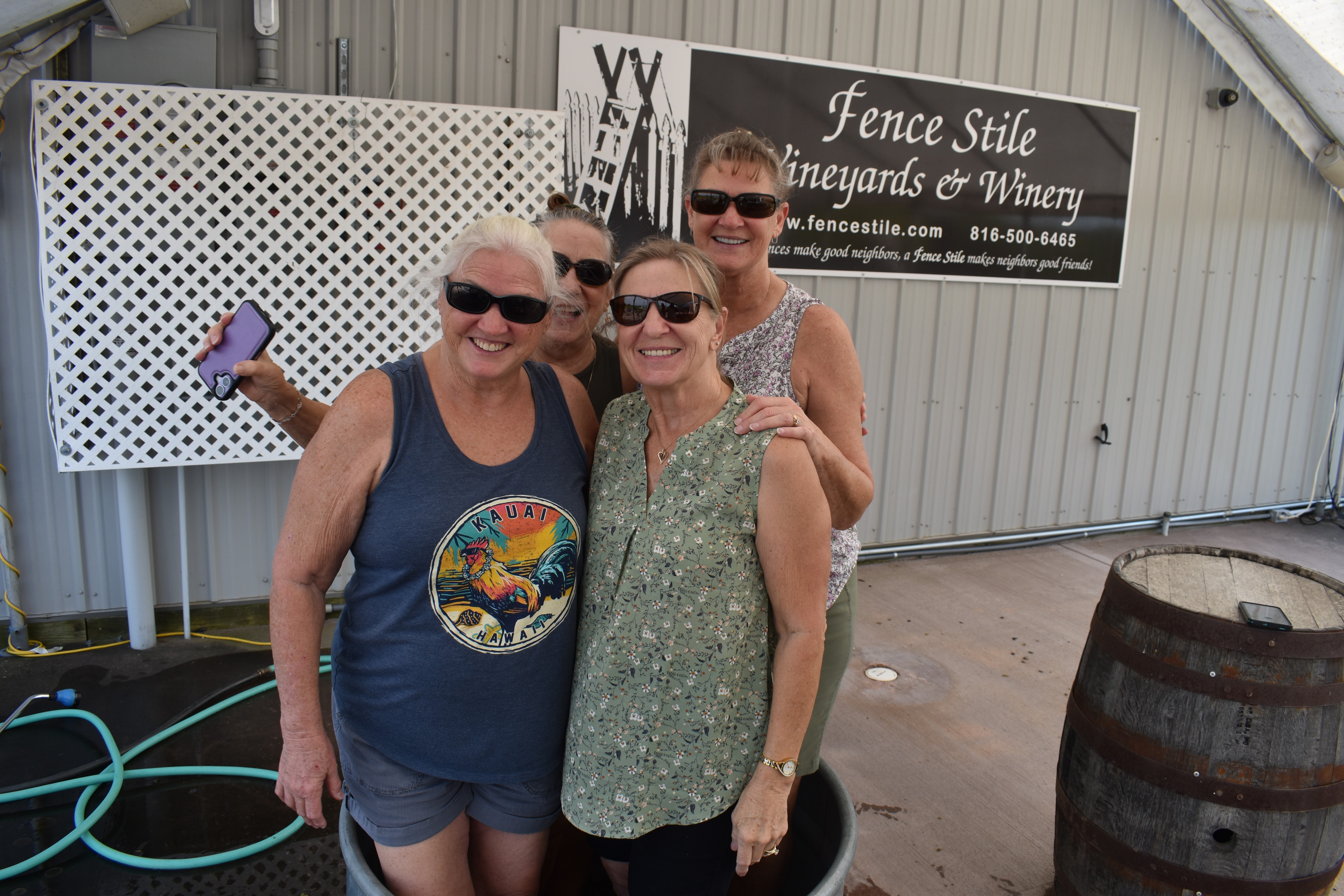 Friends gathered together during the 2026 Fence Stile Grape Stomp