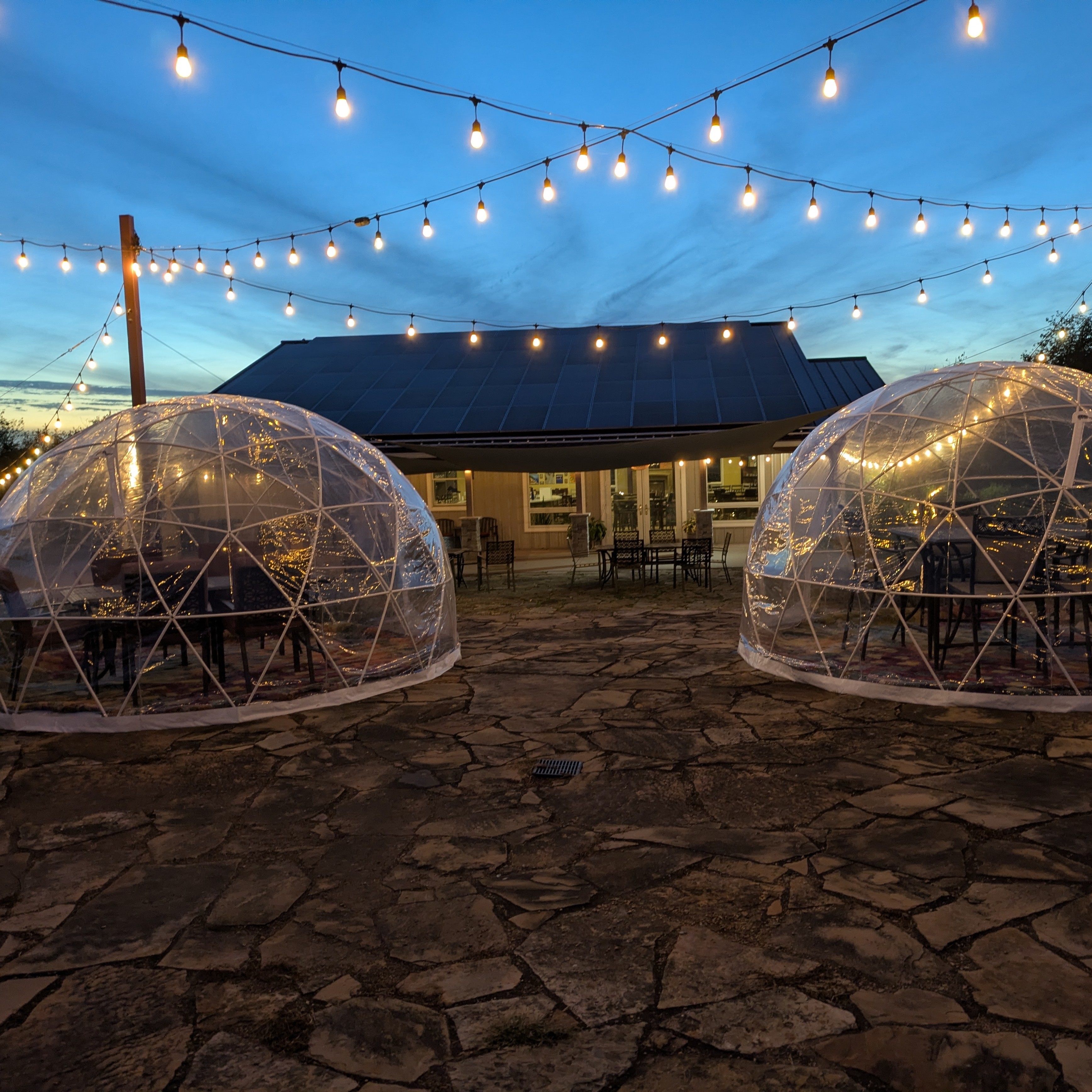 Lighted private igloo set on the Fence Stile patio