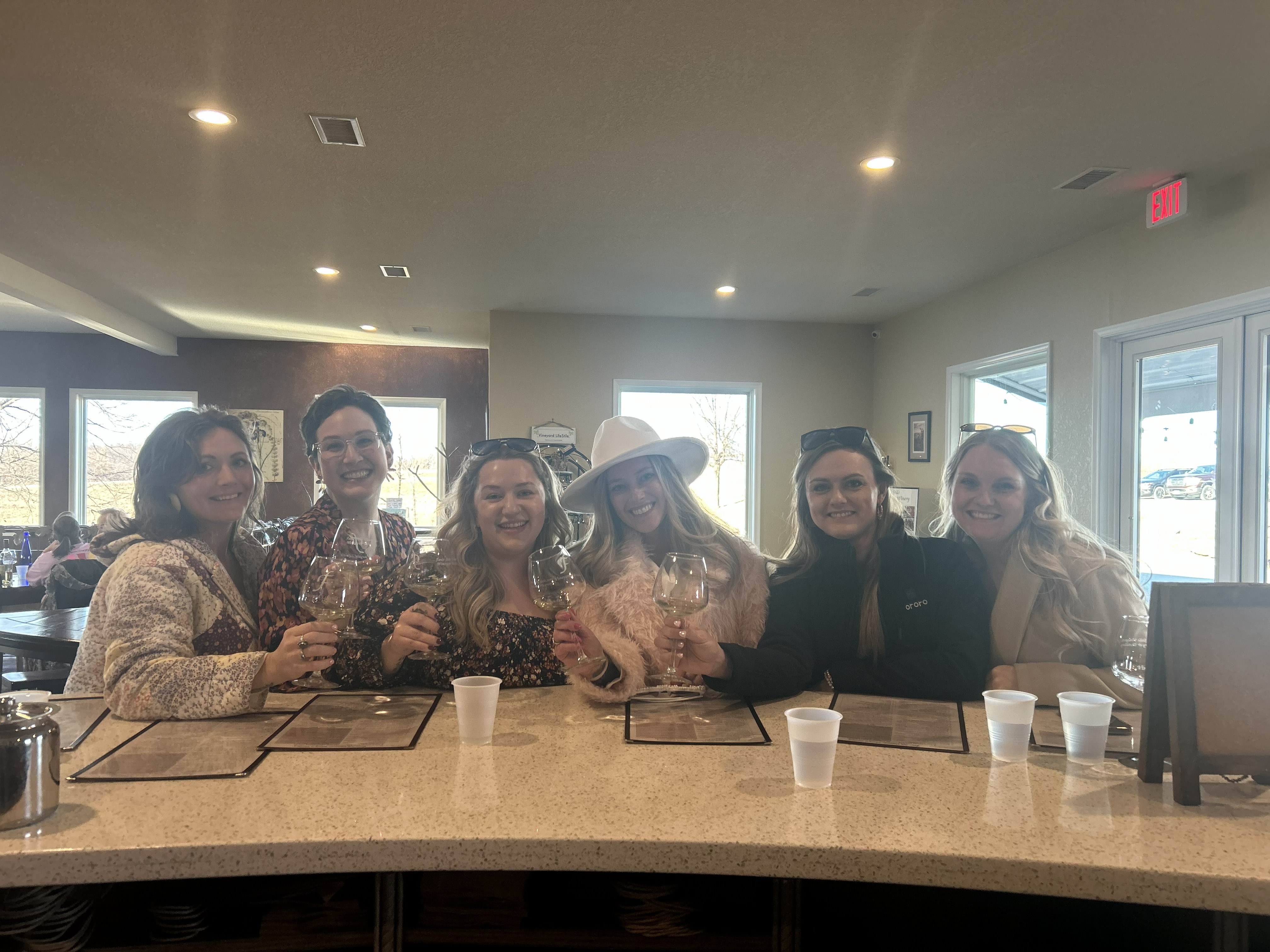 Guests gathered around a tasting table during a private group experience