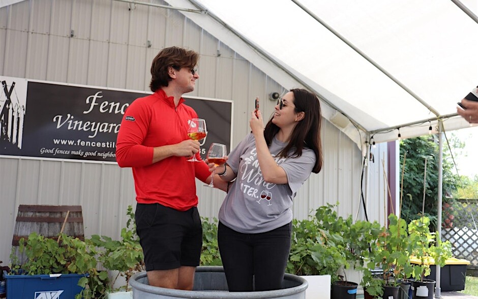 Guests sharing the Fence Stile grape stomp experience