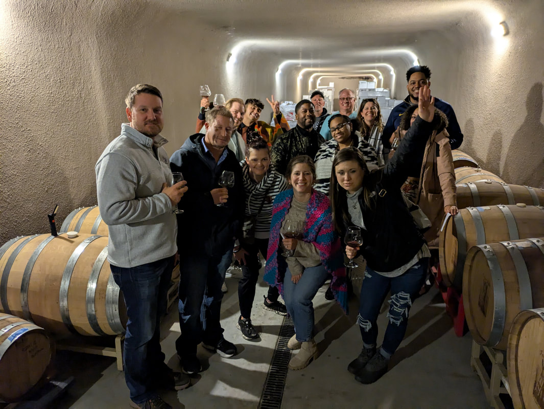 Guests gathered for a guided wine cave tour at Fence Stile