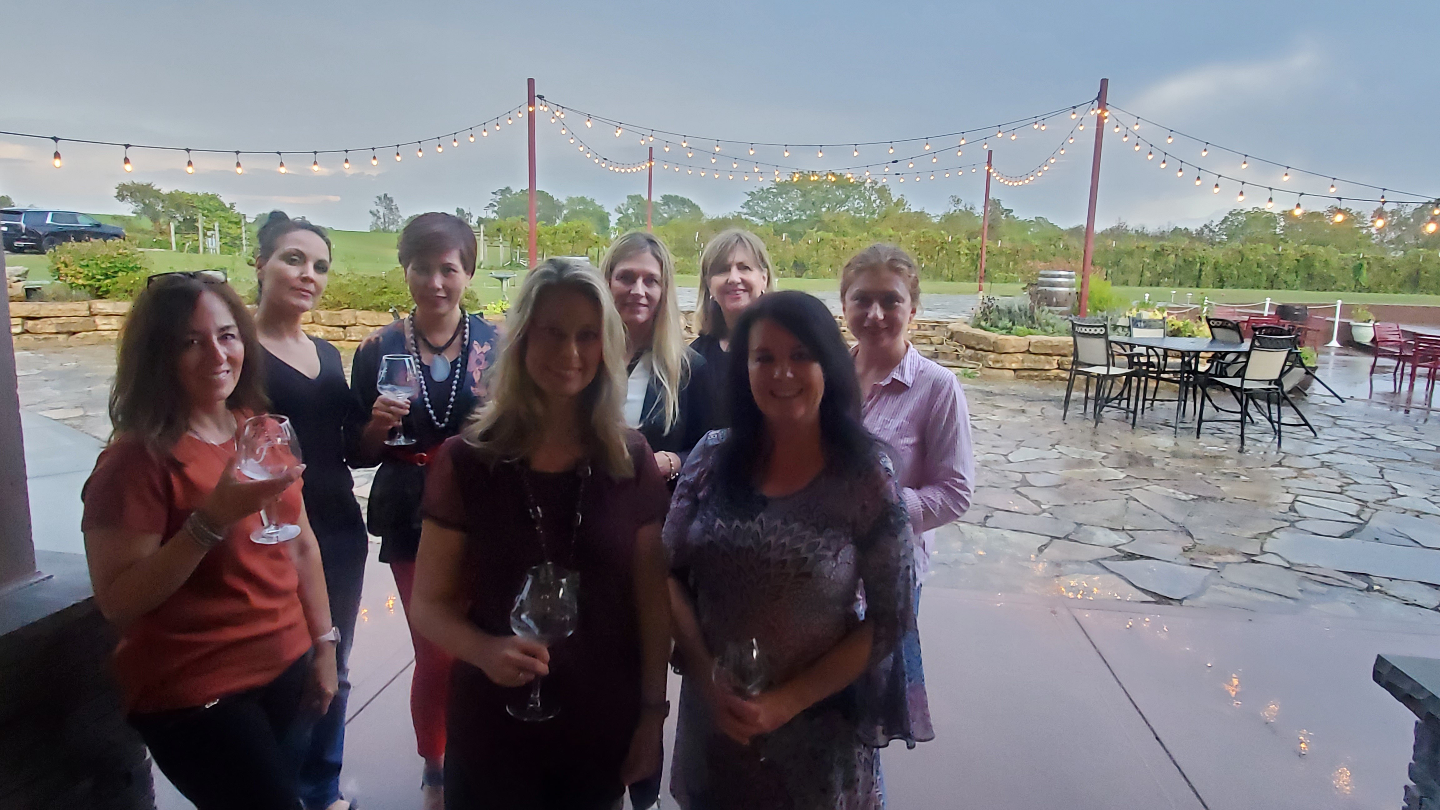 Group gathering on the patio at Fence Stile